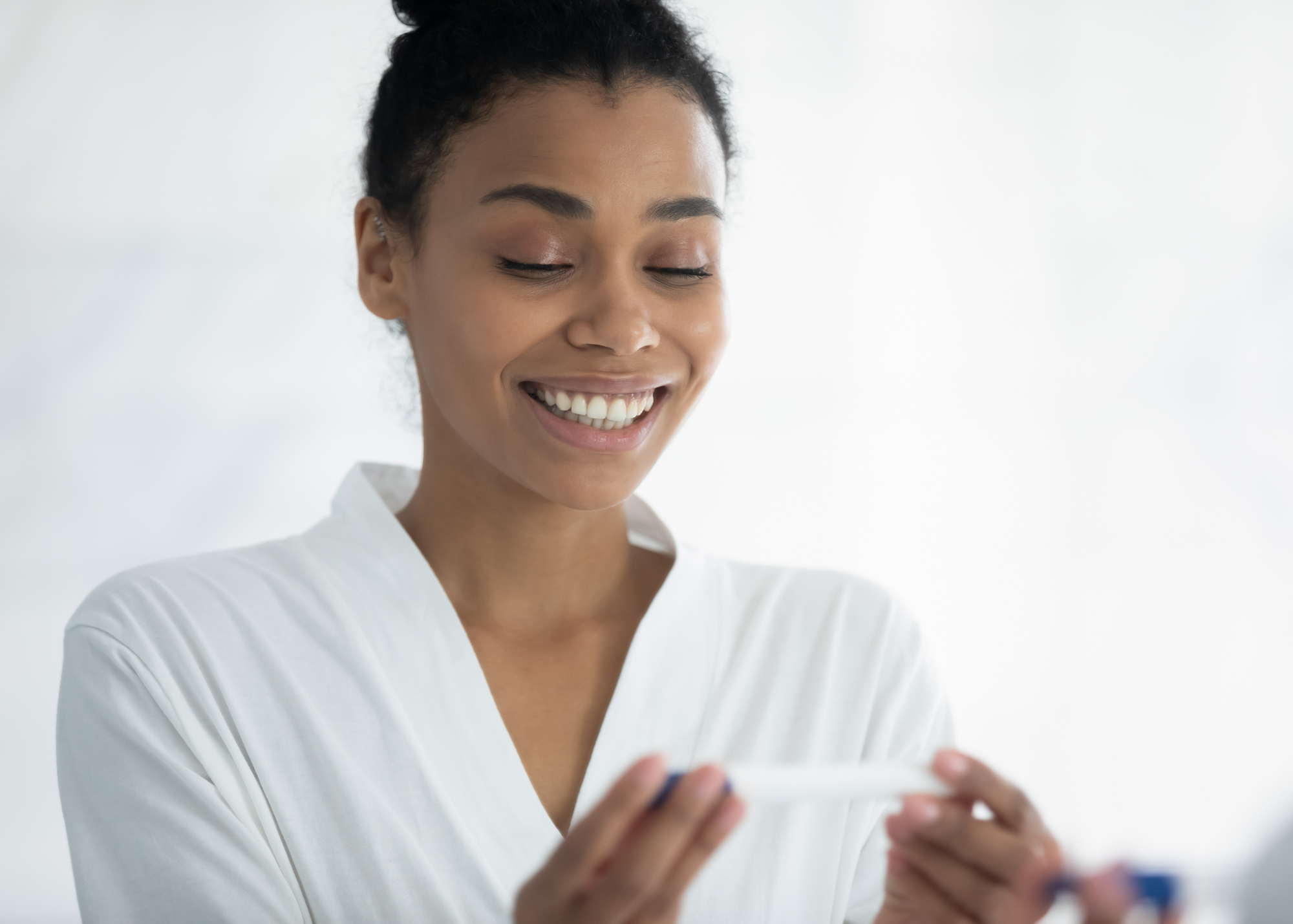 woman with pregnancy test in Fort Mill SC